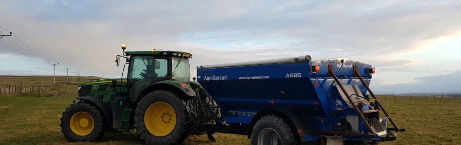 Tractor and lime spreader available for hire.